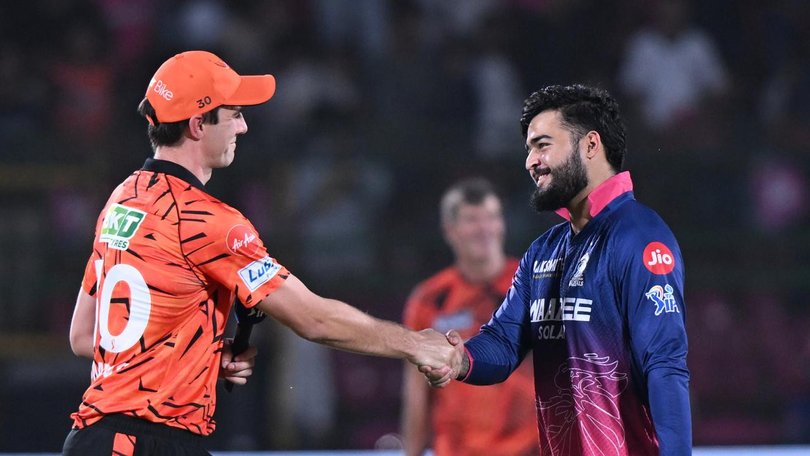 Sunrisers' Pat Cummins is welcomed back to the IPL by Rajasthan Royals captain Riyan Parag. (AP PHOTO)