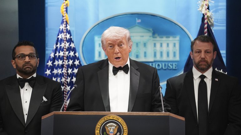 US President Donald Trump speaks during a press conference while flanked by FBI Director Kash Patel and Secretary of Homeland Security Markwayne Mullin.