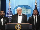 US President Donald Trump speaks during a press conference while flanked by FBI Director Kash Patel and Secretary of Homeland Security Markwayne Mullin.