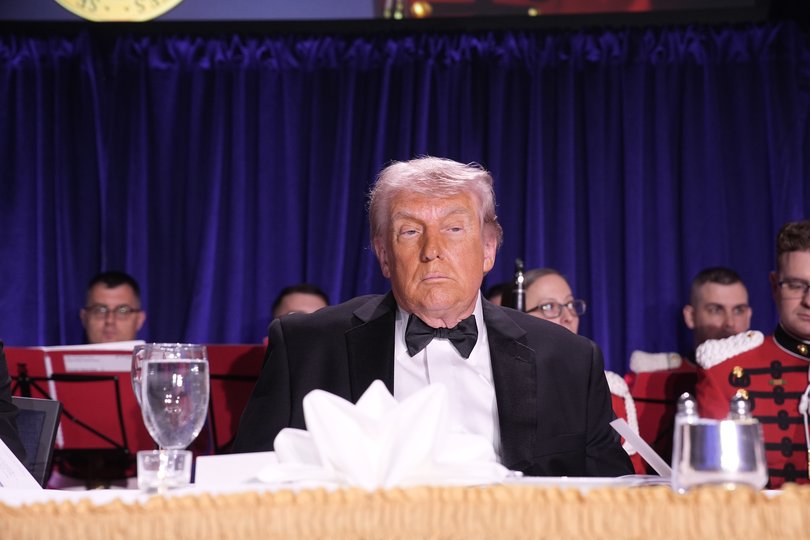 US President Donald Trump participates in the White House Correspondents' Association Dinner in Washington.