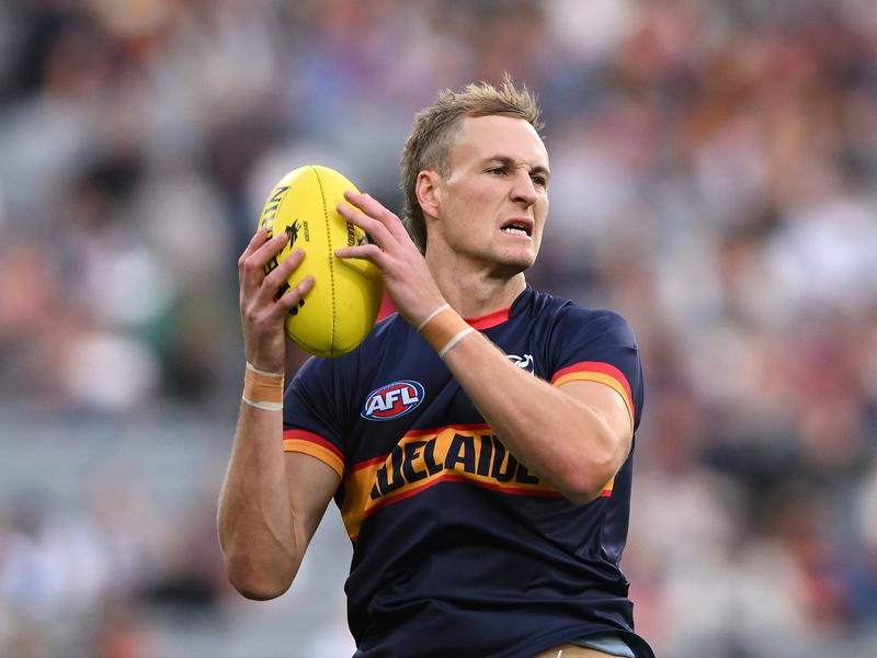 Jordan Dawson warming up: Adelaide's captain was inspirational in tough circumstances in Brisbane. 
