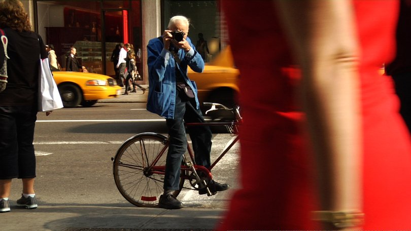 Bill Cunningham shooting on the street in New York City from the feature-length documentary, Bill Cunningham New York.
