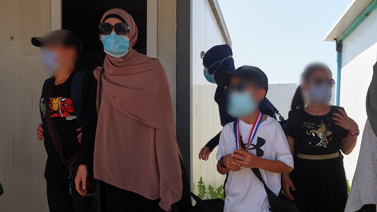 Members of Australian families at Roj Camp prepare to leave for Damascus as part of a second repatriation effort by Syrian authorities.