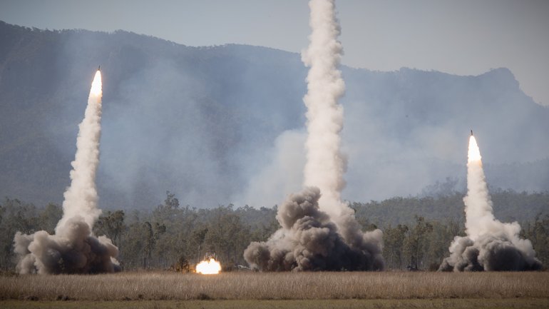 High Mobility Artillery Rocket Systems of the United States Army and United States Marine Corps launch rockets during a firepower demonstration held at Shoalwater Bay Training Area in Queensland, during Talisman Sabre 2021.