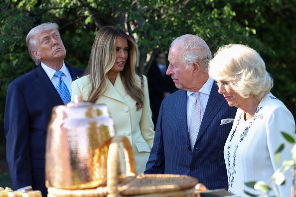 WASHINGTON, DC - APRIL 27: U.S. President Donald Trump, first lady Melania Trump, King Charles III and Queen Camilla tour the South Lawn at the White House on day one of the royal couple's state visit  on April 27, 2026 in Washington, D.C. The visit will include stops at the nation's capital, New York City, and Virginia, arranged to celebrate the United States of America's 250th anniversary of its independence. (Photo by Suzanne Plunkett-Pool/Getty Images)