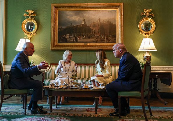 WASHINGTON, DC - APRIL 27: U.S. President Donald Trump and first lady Melania Trump host King Charles III and Queen Camilla for afternoon tea at the White House on day one of their State Visit to the United States of America on April 27, 2026 in Washington, D.C. The visit will include stops at the nation's capital, New York City, and Virginia, arranged to celebrate the United States of America's 250th anniversary of its independence. (Photo by Suzanne Plunkett - Pool via Samir Hussein/WireImage)