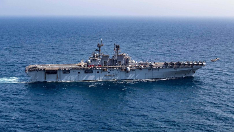 A US Marine Corps F-35B Lightning II launches from amphibious assault ship USS Tripoli in the Arabian Sea.