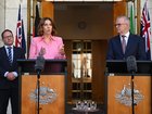 Australian Prime Minister Anthony Albanese and Australian Communications Minister Anika Wells speak to the media during a press conference at Parliament House in Canberra.