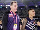Ross Lyon with Michael Walters during the coach’s last season in charge of Fremantle in 2019.