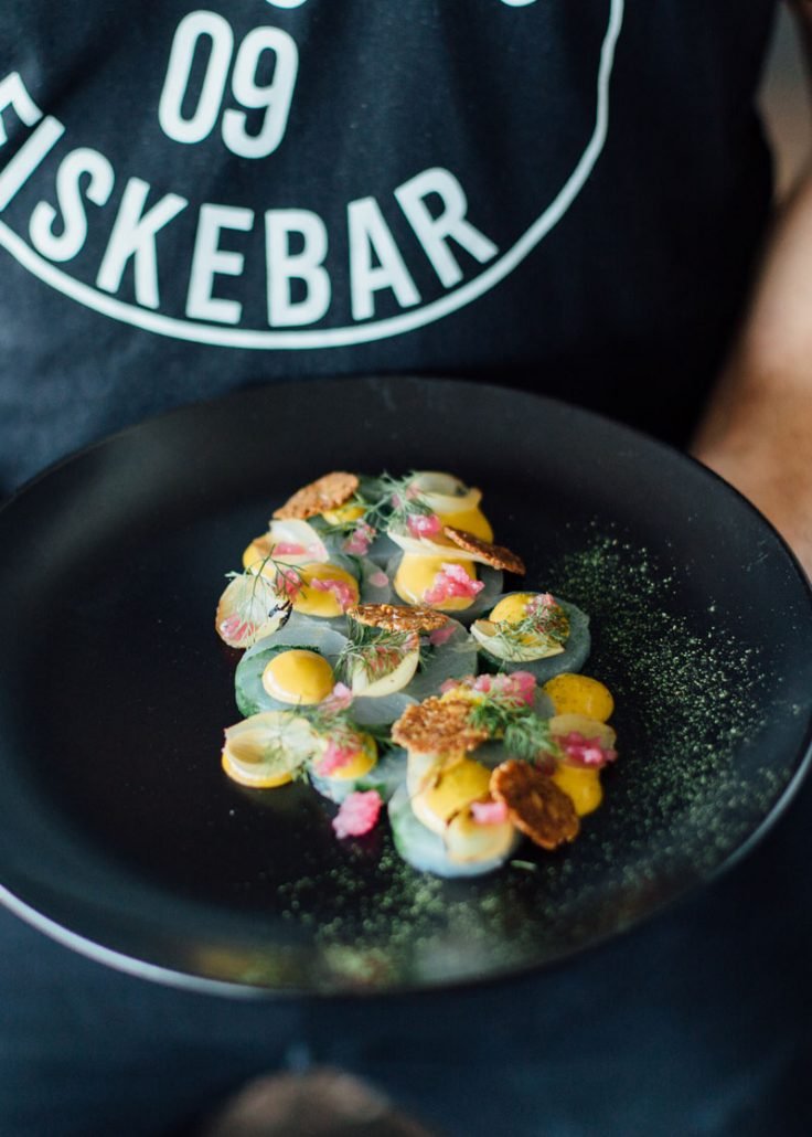 Once the domain of butchers and wholesalers, Copenhagen’s Meatpacking District has evolved into a neon-lit cluster of bars, restaurants and creative studios. 