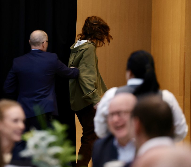 A protester at the CME breakfast.