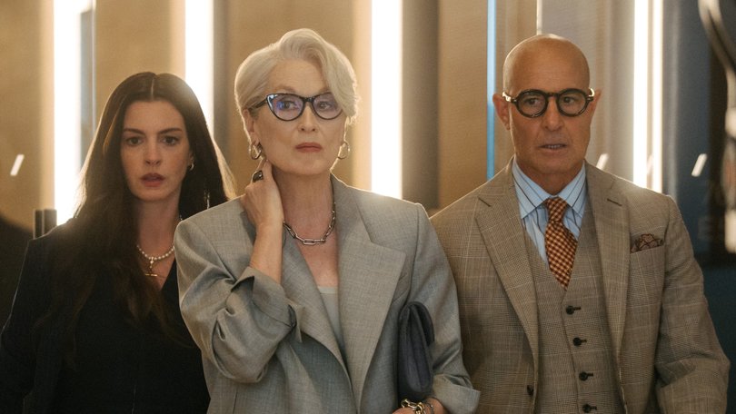 Anne Hathaway with Meryl Streep and Stanley Tucci in The Devil Wears Prada 2.