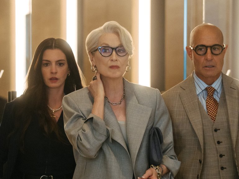 Anne Hathaway with Meryl Streep and Stanley Tucci in The Devil Wears Prada 2.