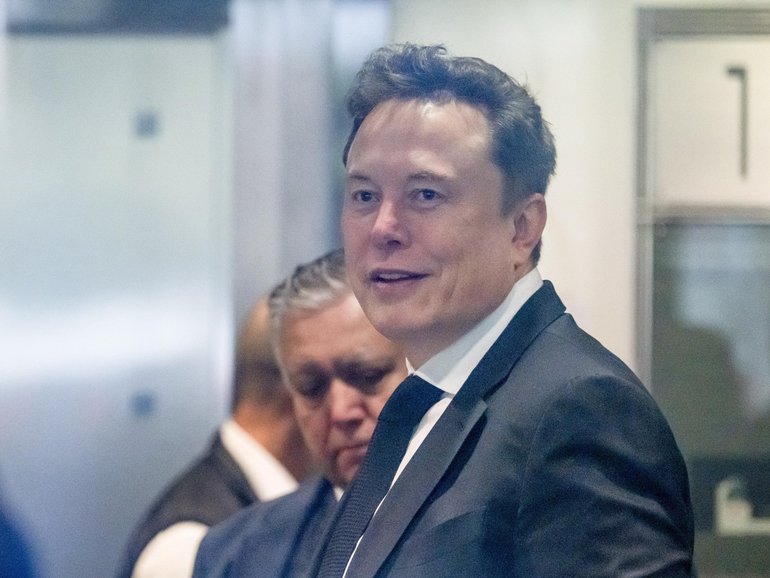 Elon Musk, chief executive officer of Tesla Inc., arrives at federal court in Oakland, California, US, on Tuesday, April 28, 2026. Elon Musk is suing OpenAI and Microsoft Corp. over claims that the startup abandoned its founding mission when it took billions of dollars in backing from the software stalwart and planned its restructuring. Photographer: David Paul Morris/Bloomberg David Paul Morris