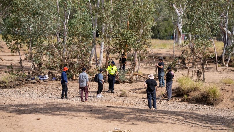 Volunteers join police and defence force members as the search for Sharon, 5, enters its fifth day.