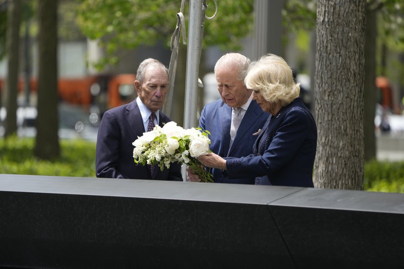 King Charles III, center, and Queen Camilla, right, visit the the 9/11 Memorial & Museum with former New York City mayor Michael Bloomberg.
