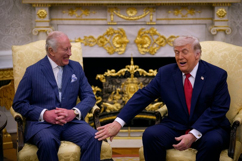 US President Donald Trump touches King Charles III during a meeting in the Oval Office of the White House on April 28, 2026 in Washington, DC.