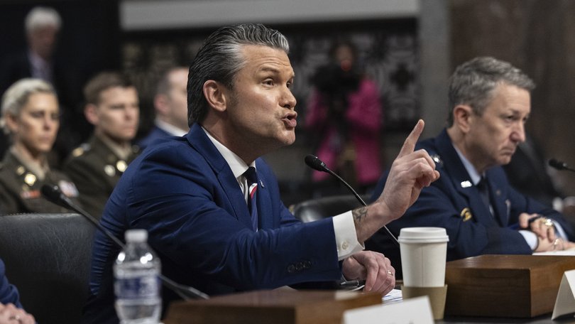 Secretary of Defense Pete Hegseth, center, and Gen. Dan Caine, right, chairman of the Joint Chiefs of Staff, testify during a Senate Armed Services Committee hearing on the department’s budget request on Capitol Hill in Washington, on Thursday, April 30, 2026. 