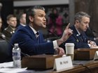 Secretary of Defense Pete Hegseth, center, and Gen. Dan Caine, right, chairman of the Joint Chiefs of Staff, testify during a Senate Armed Services Committee hearing on the department’s budget request on Capitol Hill in Washington, on Thursday, April 30, 2026. 