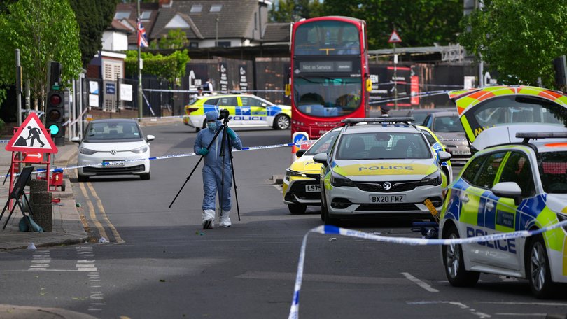 Forensic police officer at the scene where two people were stabbed on April 29 in the Golders Green, London.