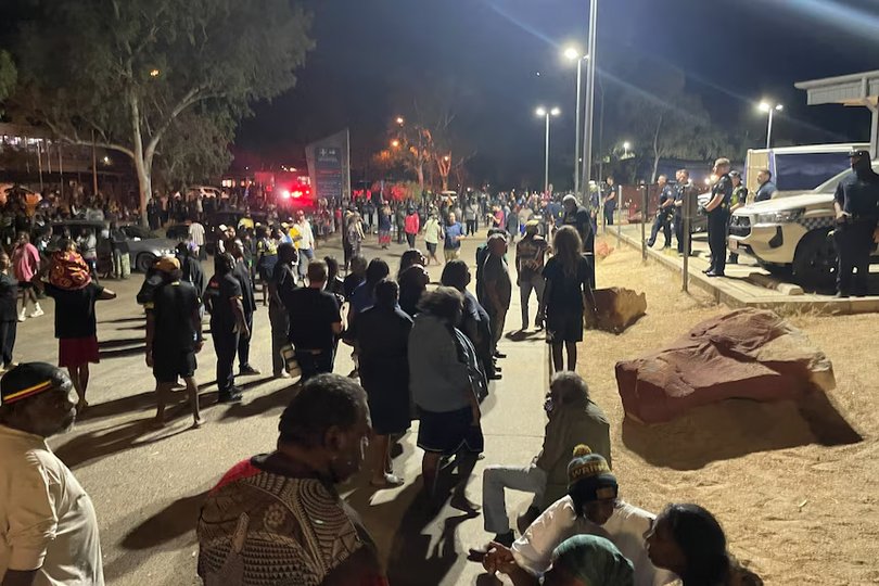 Outside the hospital, the crowd swelled and violence erupted.