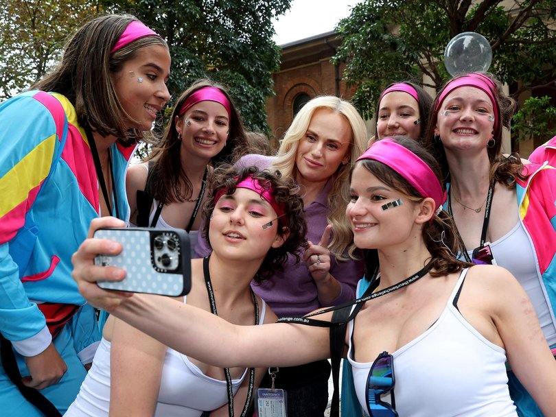Ms Wilson was all smiles as she was swarmed by fans outside the court. Picture: NewsWire / John Appleyard