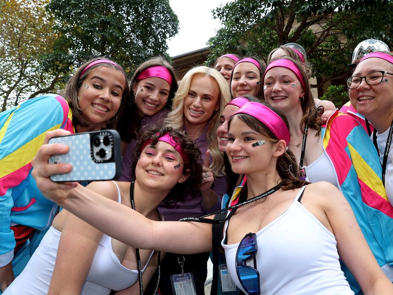 Rebel Wilson took selfies with year 12 students outside the Federal Court in Sydney on Friday. Picture: NewsWire / John Appleyard