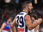 Sam Switkowski of the Dockers celebrates kicking a goal.