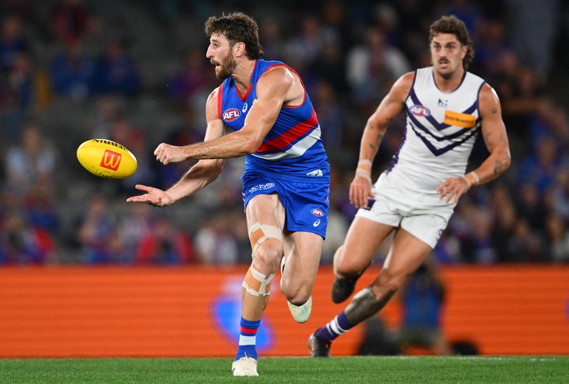 MELBOURNE, AUSTRALIA - MAY 01: Marcus Bontempelli of the Bulldogs handballs during the round eight AFL match between Western Bulldogs and Fremantle Dockers at Marvel Stadium, on May 01, 2026, in Melbourne, Australia. (Photo by Quinn Rooney/Getty Images)