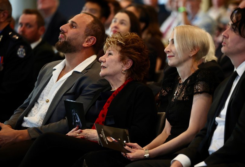 Dennis Cometti’s wife Velia Cometti and son Mark (left) and daughter Ricki (right).