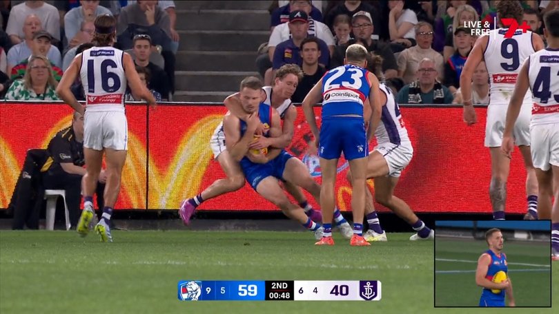 Will Lewis gets a high free kick.