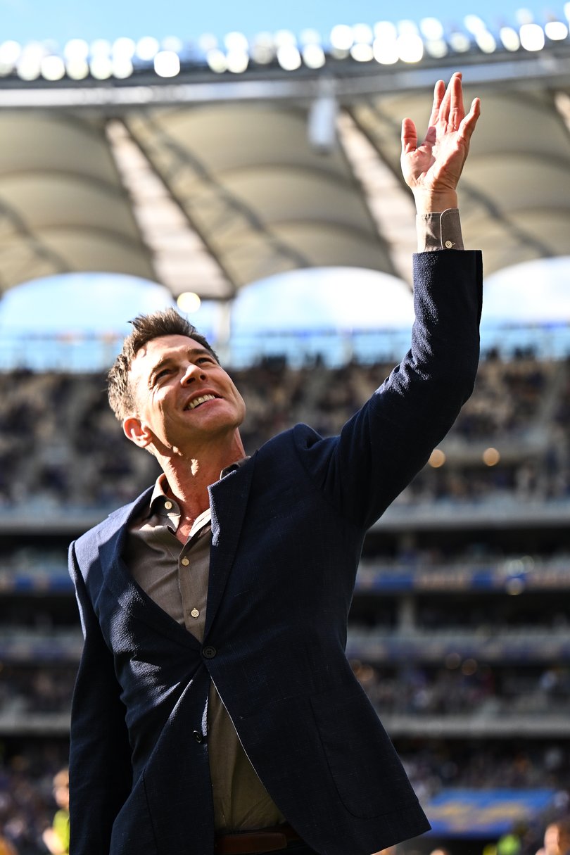 PERTH, AUSTRALIA - MAY 02: Ben Cousins walks a lap of Honour for the 20th anniversary of the 2006 AFL Premiership win during the 2026 AFL Round 08 match between the West Coast Eagles and the Richmond Tigers at Optus Stadium on May 2, 2026 in Perth, Australia. (Photo by Daniel Carson/AFL Photos via Getty Images)