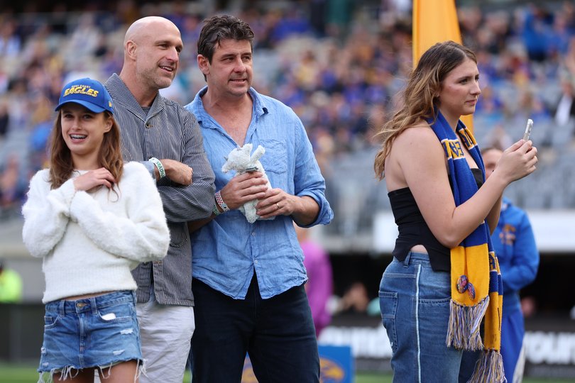 PERTH, AUSTRALIA - MAY 02: Chris Judd and Andrew Embley in the guard of honour during the round eight AFL match between West Coast Eagles and Richmond Tigers at Optus Stadium, on May 02, 2026, in Perth, Australia. (Photo by Janelle St Pierre/AFL Photos/via Getty Images)