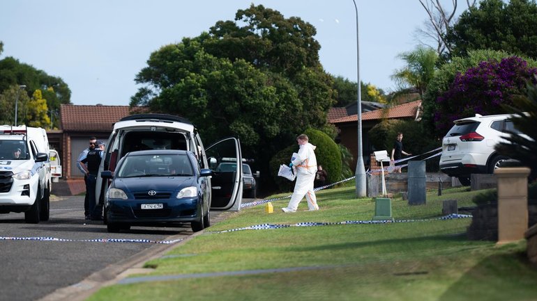 A suburban home has been cordoned off in Sydney's southwest after a fatal domestic incident. (Sarah Wilson/AAP PHOTOS)