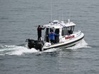 Three are dead and four others have been rescued after two boats got into trouble at Ballina, New South Wales.