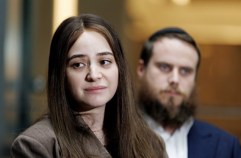 Sheina Gutnick leaves after giving evidence at the first public hearings of the royal commission.