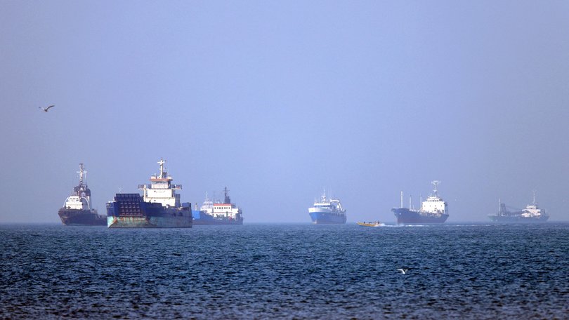 In this picture obtained from Iran's ISNA news agency on May 4, 2026, vessels are pictured anchored in the Strait of Hormuz off Bandar Abbas in southern Iran. 