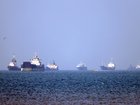 In this picture obtained from Iran's ISNA news agency on May 4, 2026, vessels are pictured anchored in the Strait of Hormuz off Bandar Abbas in southern Iran. 