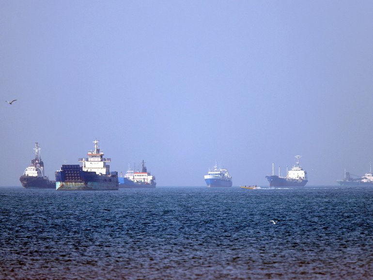 In this picture obtained from Iran's ISNA news agency on May 4, 2026, vessels are pictured anchored in the Strait of Hormuz off Bandar Abbas in southern Iran. 