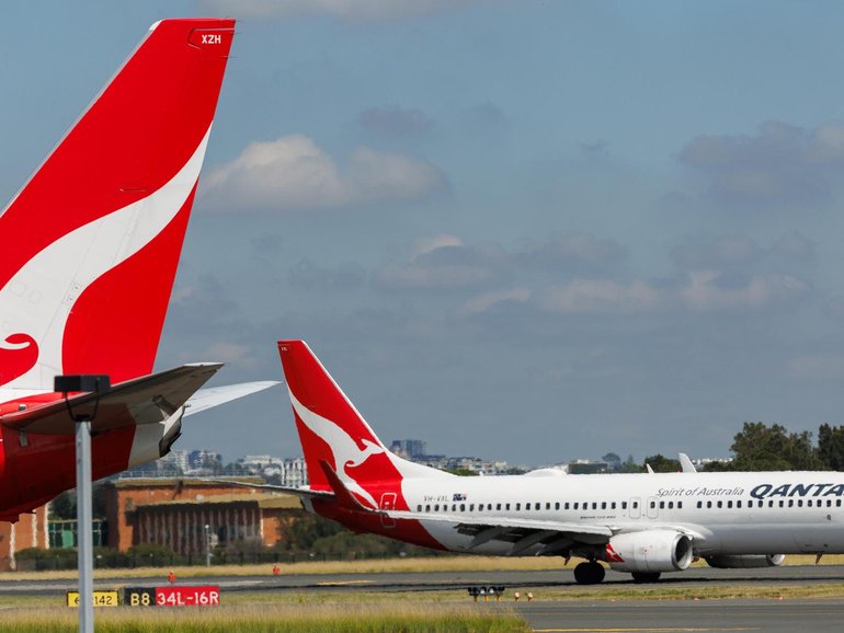 Qantas CEO told professional investors travellers would prefer to cut back on drinking or socialising rather than air travel.
