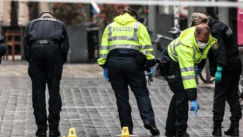 A man was arrested after authorities say he drove through a busy shopping area, killing two people. 
