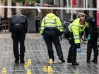 A man was arrested after authorities say he drove through a busy shopping area, killing two people. 