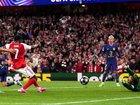 Arsenal's Bukayo Saka scores the goal that took his team to the Champions League final. (AP PHOTO)