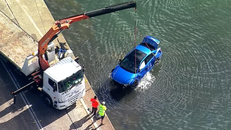Emergency services have made a heartbreaking discovery in the search for a young man who became trapped inside a car after it ploughed into a weir. 