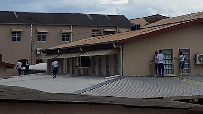 A teenager shot dead two staff members and injured two other people, including an 11-year-old girl, on Tuesday in the latest school shooting to rock Brazil.