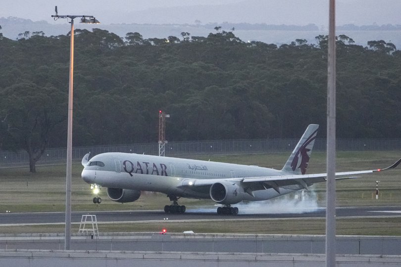 MELBOURNE, AUSTRALIA - MAY 07: Qatar Airways QR 904 with "ISIS Brides" on board lands at Melbourne Airport on May 07, 2026 in Melbourne, Australia. The women, who had traveled to Syria to join the Islamic State militant group, are expected to face questioning by Australian Federal Police upon their arrival, with authorities weighing potential charges under counter-terrorism legislation. (Photo by Asanka Ratnayake/Getty Images)
