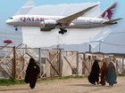 The group of 13 women and children who landed in Sydney and Melbourne this evening were greeted by officials who had warned there could be some arrests.