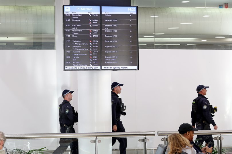 SYDNEY, AUSTRALIA - NewsWire Photos MAY 7 , 2026: AFP presence at the Arrivals area at Sydney Airport. ISIS Brides return to Australia. Isis Bride Janai Safar and her son will arrive at Sydney Airport. They were part of a group of 4 women and 9 children who are returning to Australia after years spent in a Syrian refugee camp. Picture: NewsWire / John Appleyard