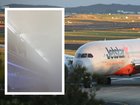 A passenger has described the 'horror movie' scenes onboard a flight from Bali as thick mist filled the cabin.