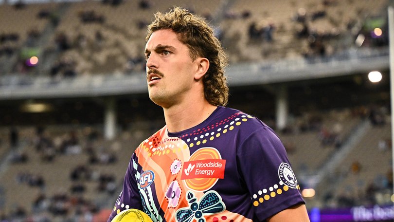 Luke Jackson of the Dockers warms up.